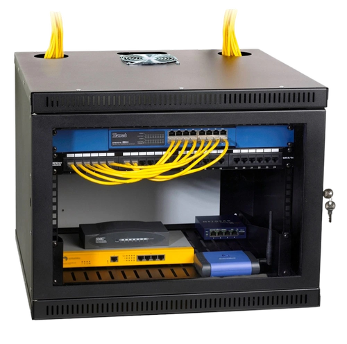 Network server cabinet with yellow Ethernet cables connected at the top, housing networking equipment like switches, a router, and fiber optic modules inside.