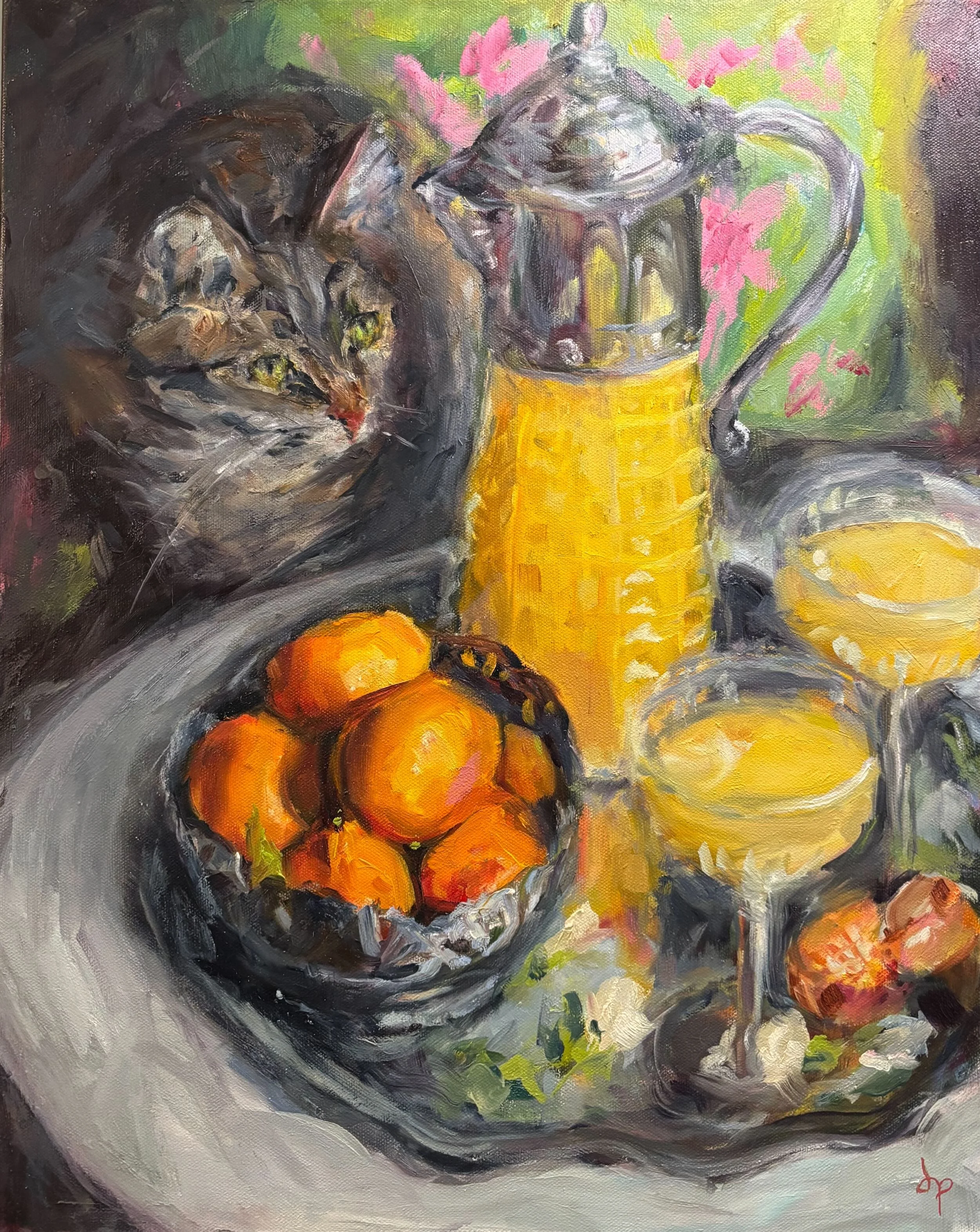 An impressionistic painting depicting a black and gray tabby cat resting on a surface, with a yellow lemon, a glass of orange juice in a pitcher and a bunch of oranges nearby on a table. The background features pink flowers and green leaves.