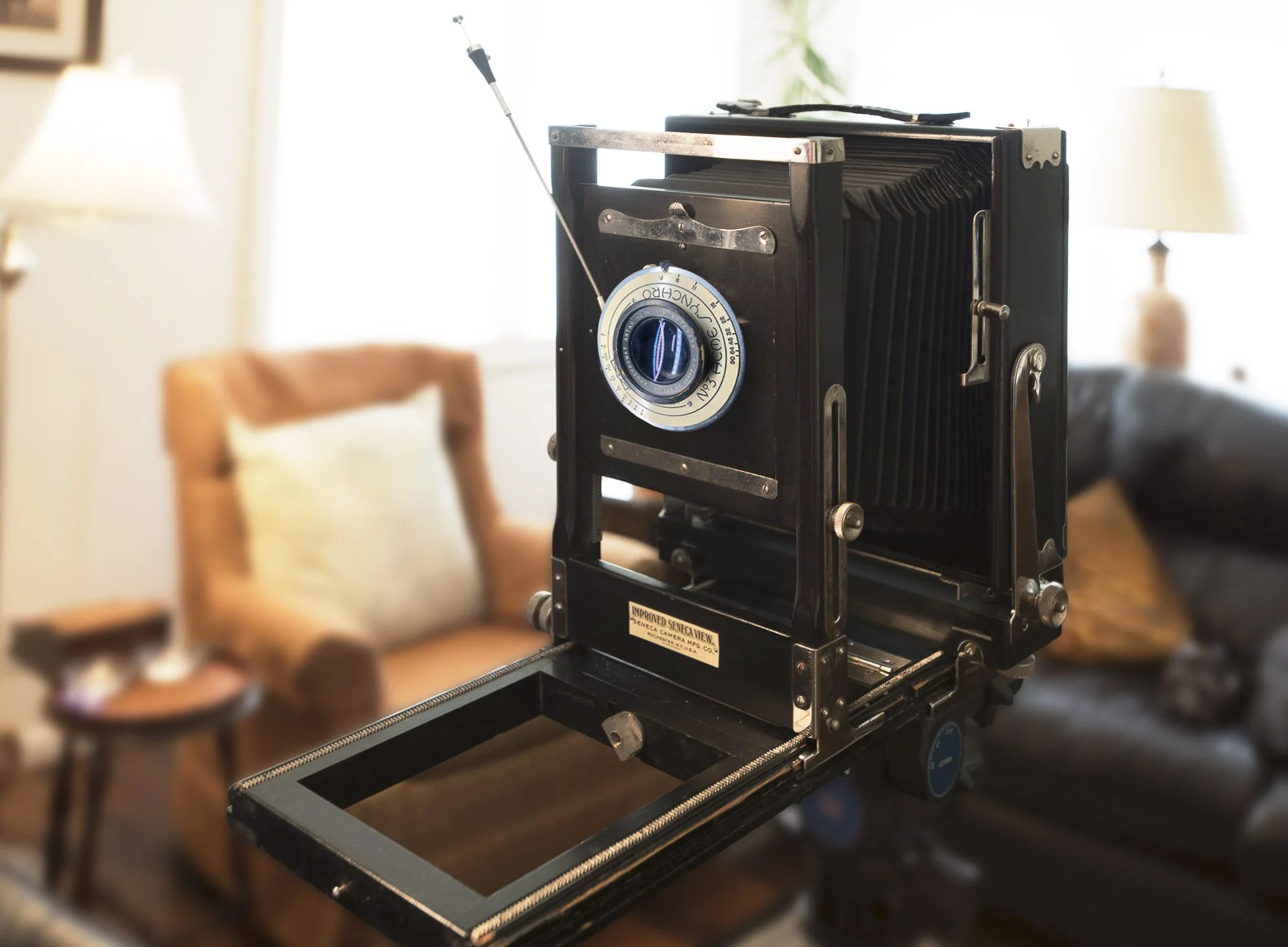 Large Format Camera with vintage lens from Tony Venti's studio set up for a portrait session.