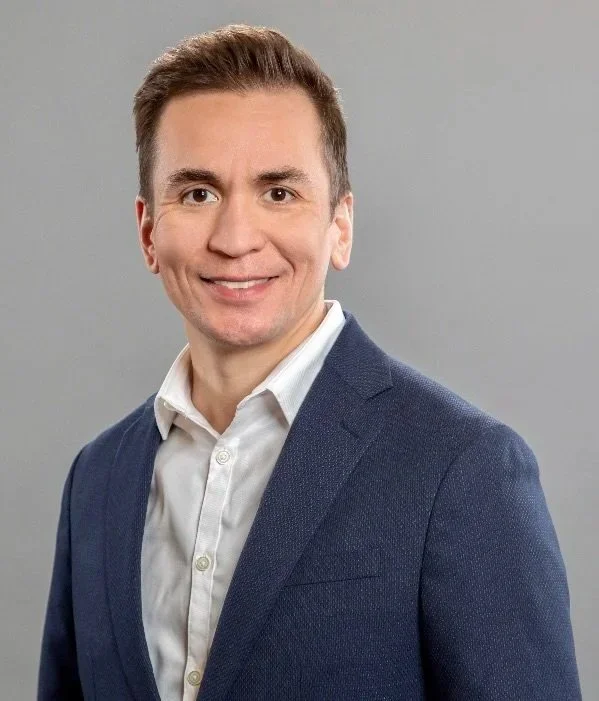 Christopher Godsoe, fractional sales leader and consultant, wearing a navy blazer.