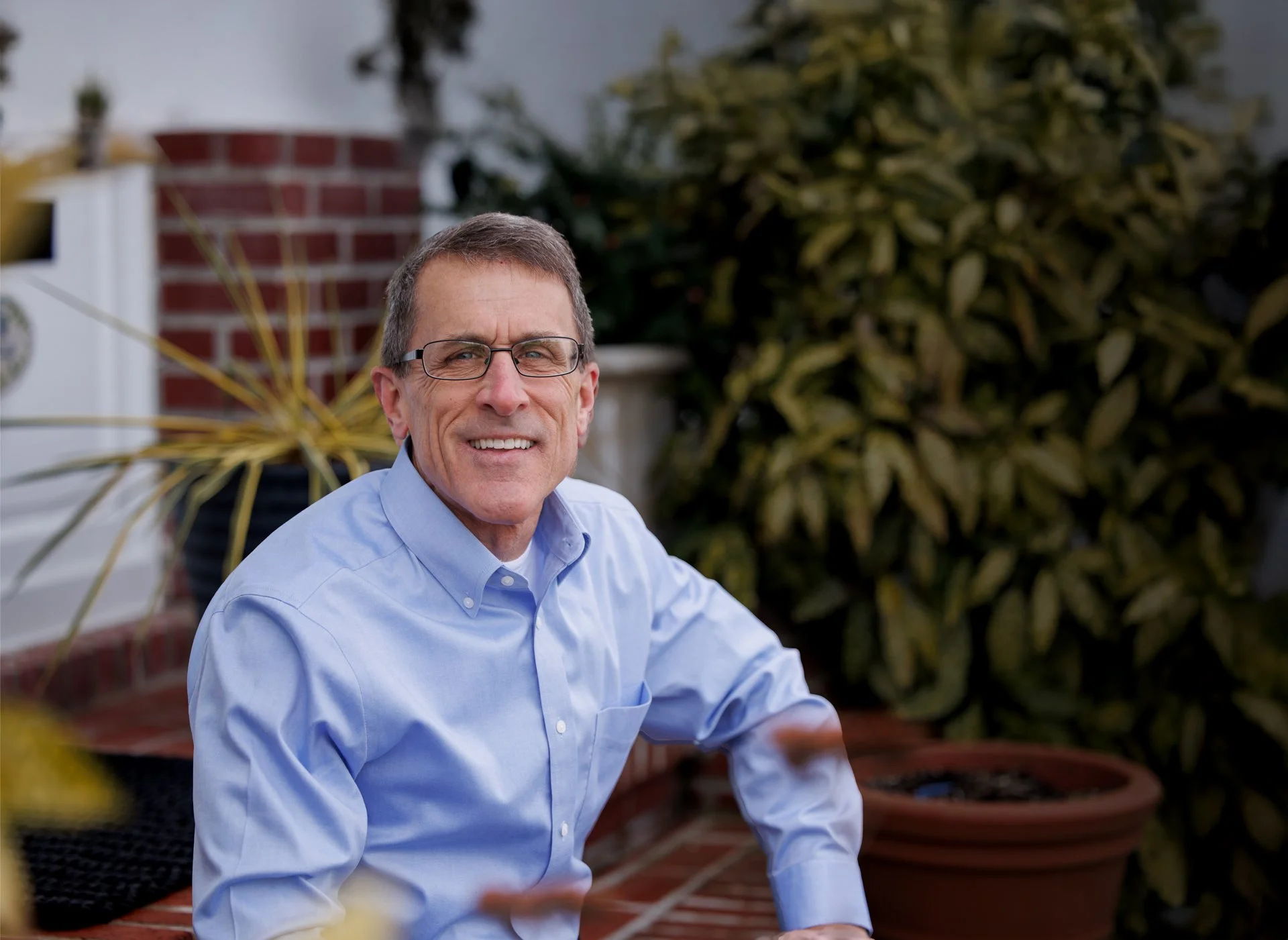 Jim Kelly sitting on porch
