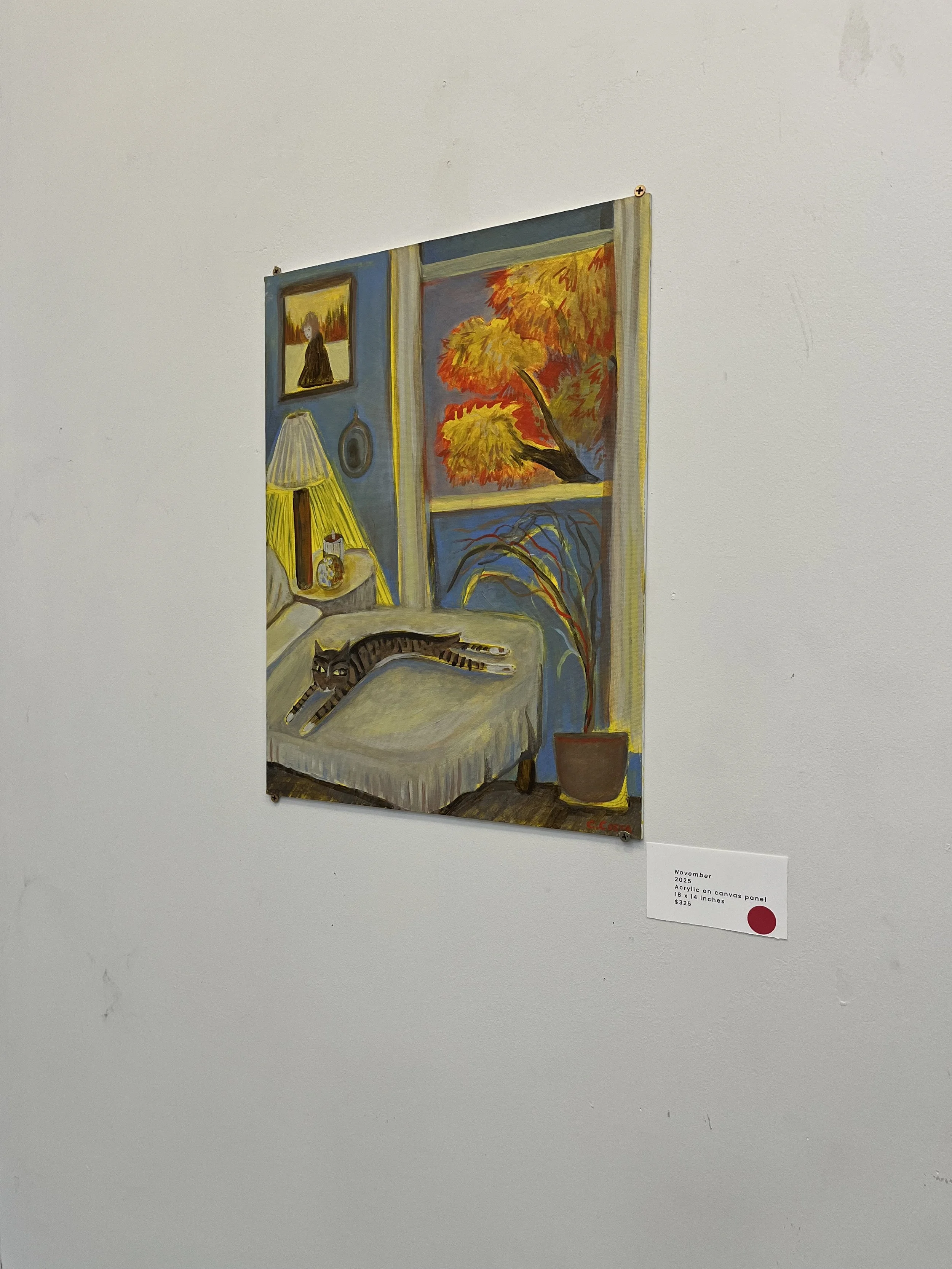 A painting of an interior scene with a window showing an autumn scene outside, a potted plant with orange leaves inside, a yellow lamp on a bedside table, a framed picture and an oval mirror on the blue wall, and a tabby cat lying on a bed.