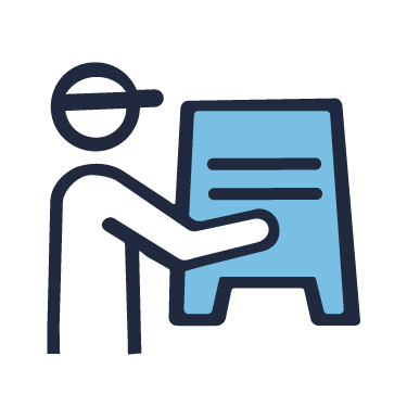 Icon of a person sitting at a desk reading a large sign or menu.