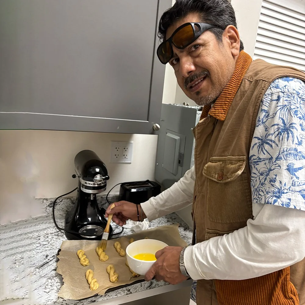 Close up of an individual in a kitchen at a baking class