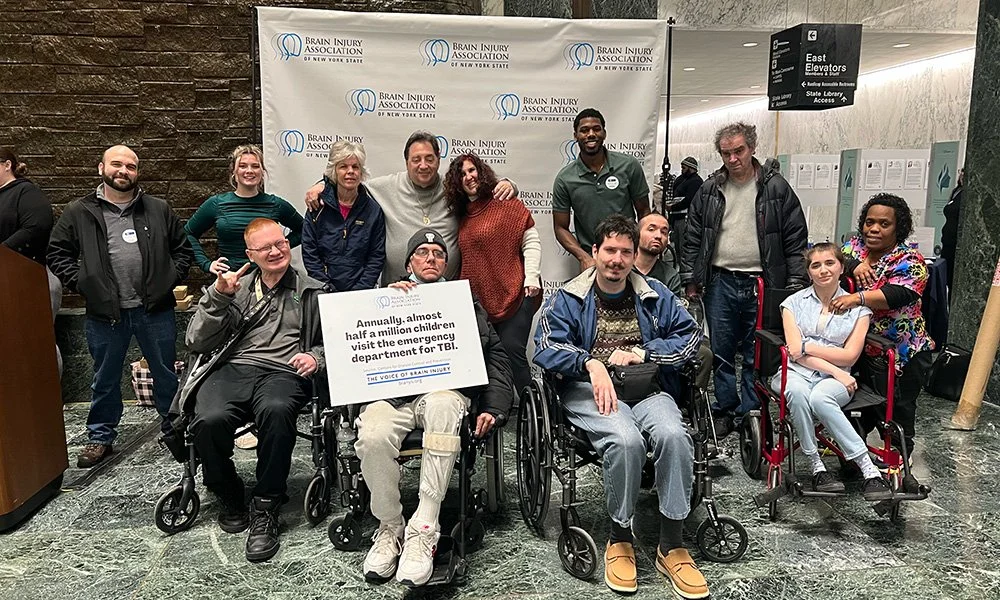 A group of people attending a Brain Injury Association event