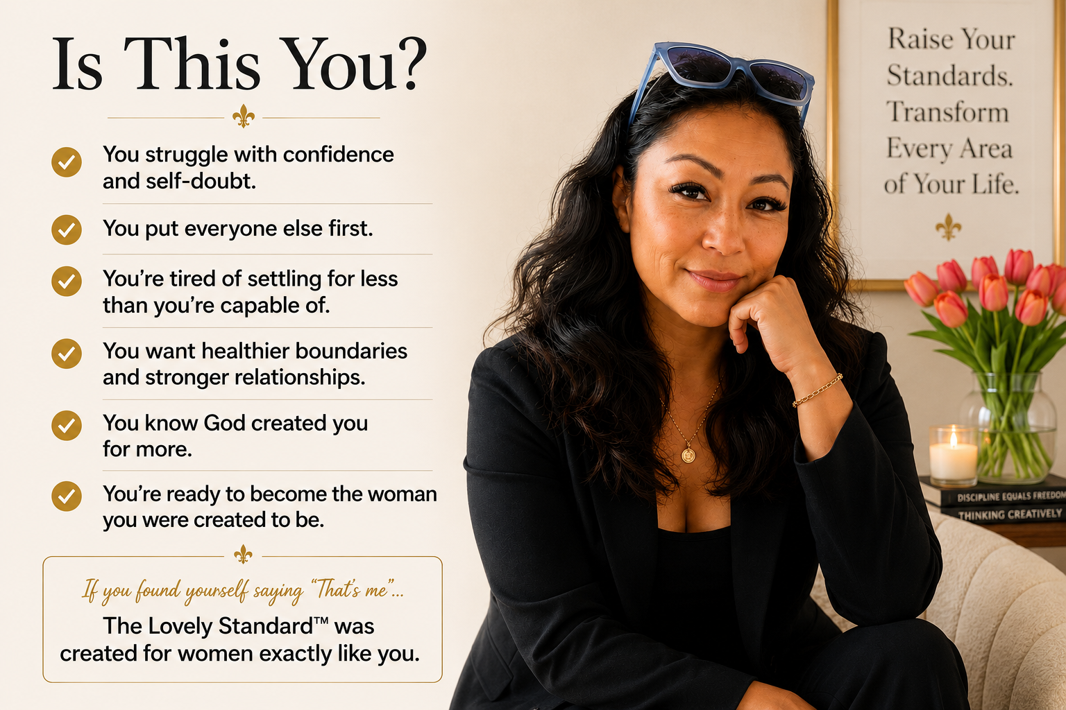 A woman with long dark hair, sitting on a beige couch, smiling and resting her chin on her hand, wearing a black blazer and glasses on her head. Behind her, a framed motivational quote and a vase of pink tulips are visible on a table.