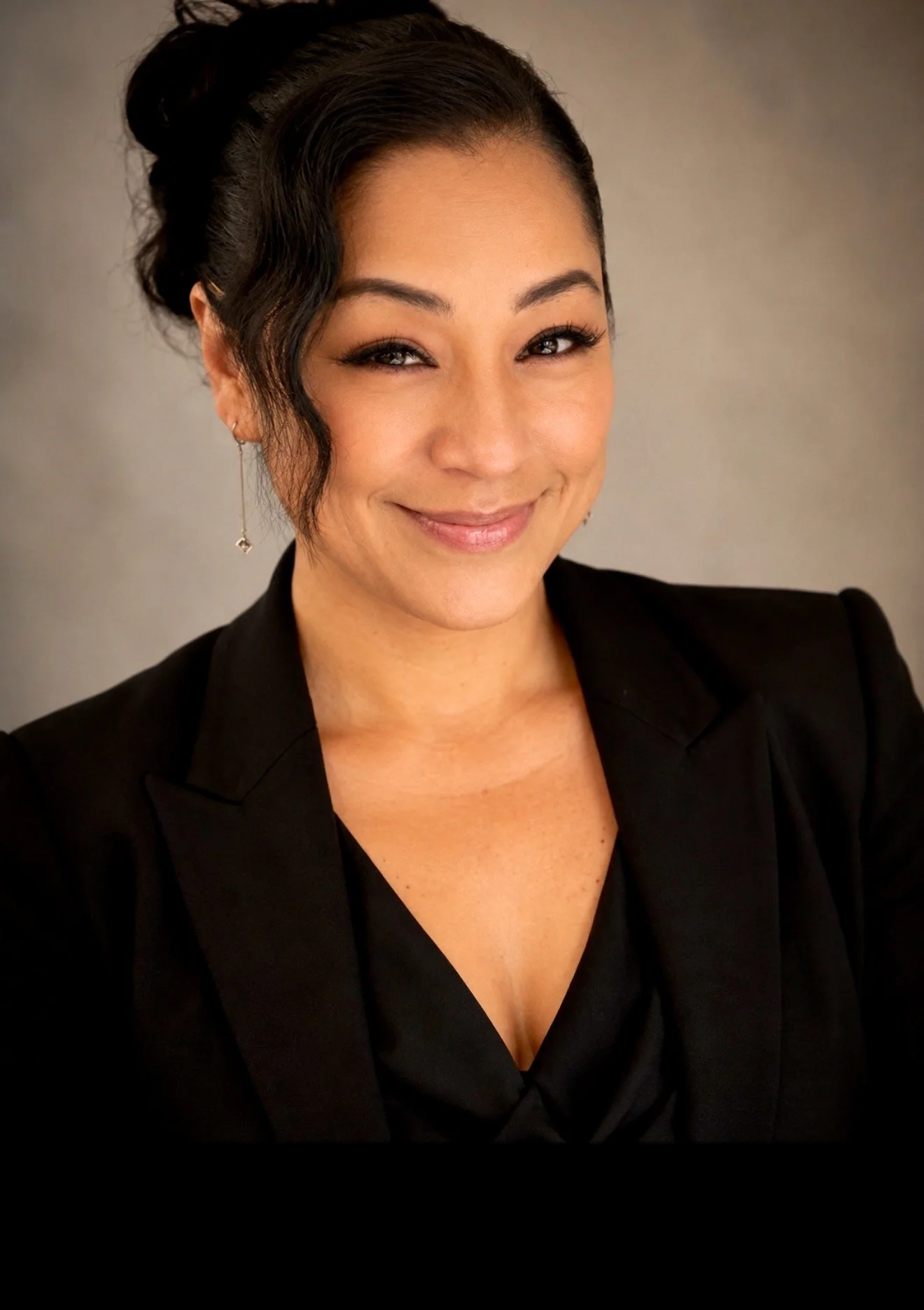 Portrait of Melisa Lovely, leadership coach, business consultant, and professional speaker.