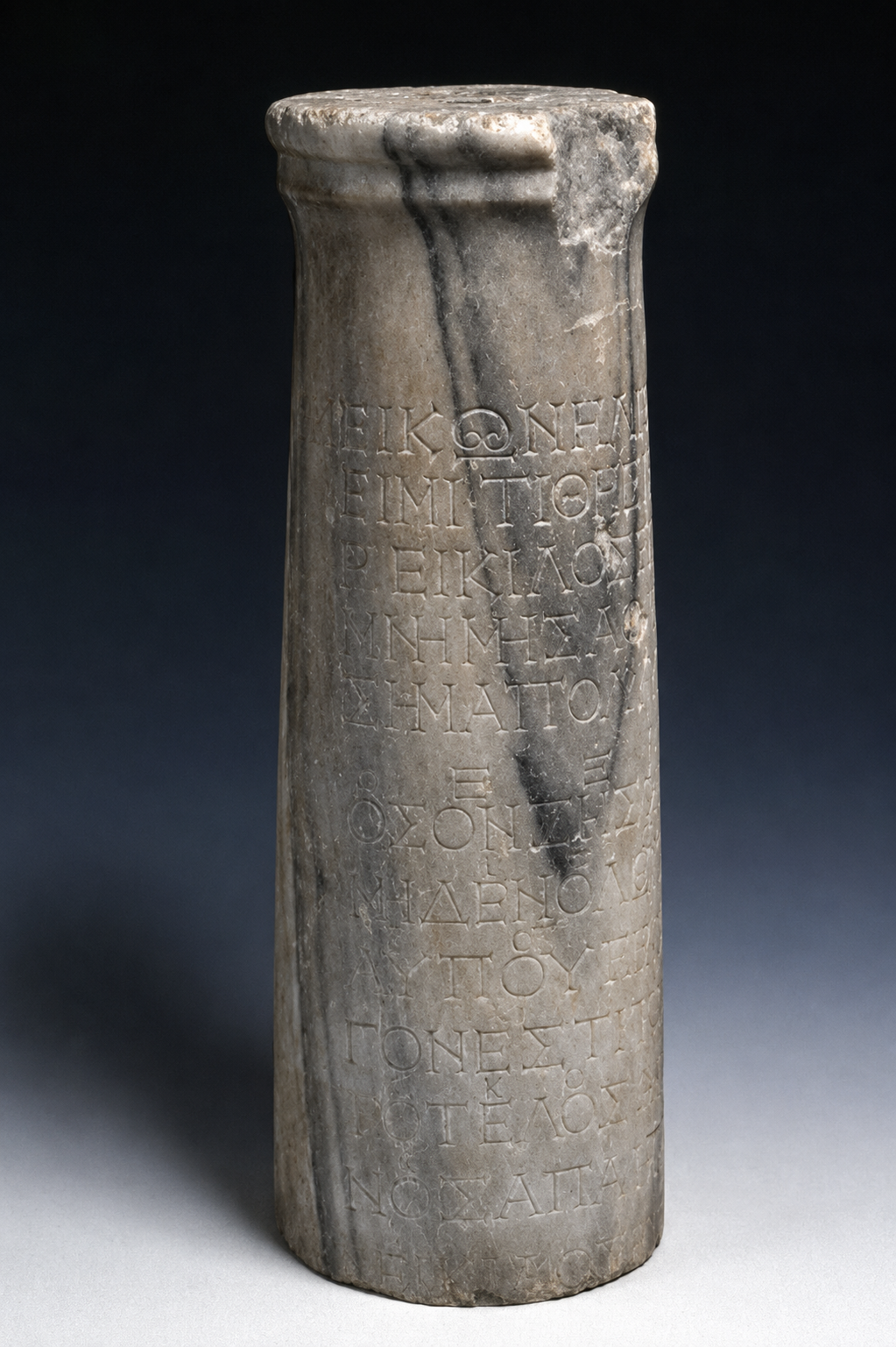 Ancient marble Greek inscribed pillar with carved Greek script.