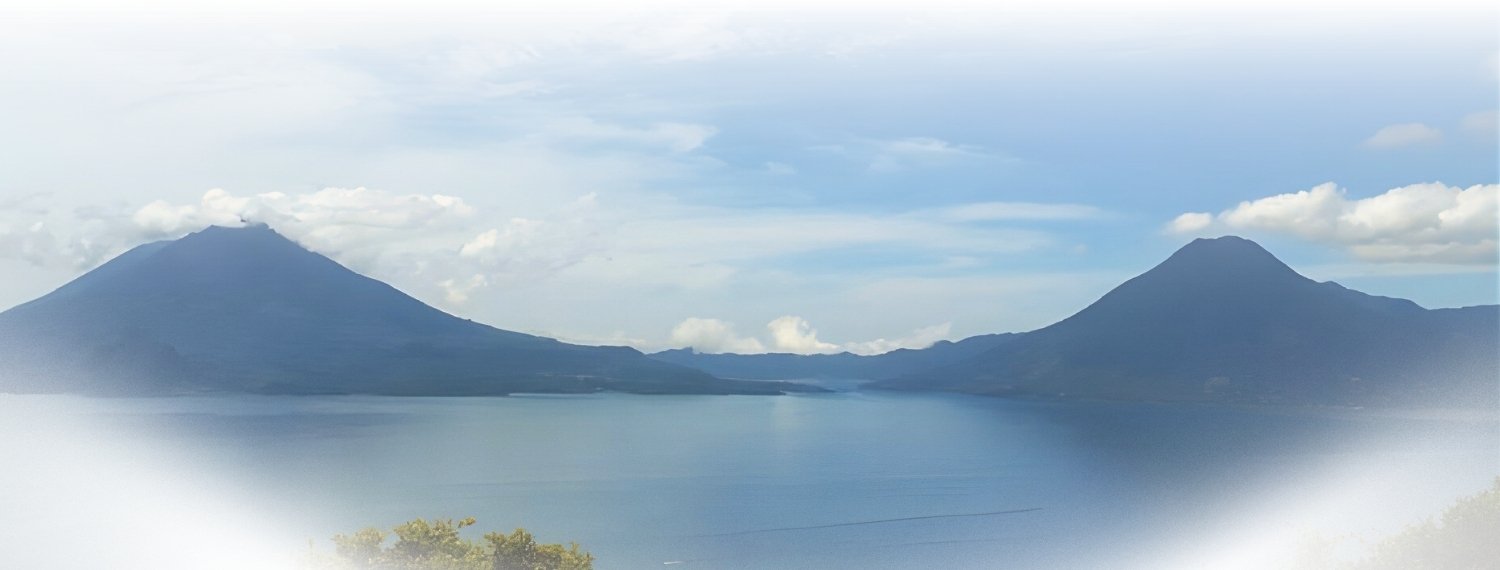 Lake Atitlan with volcanoes in the background