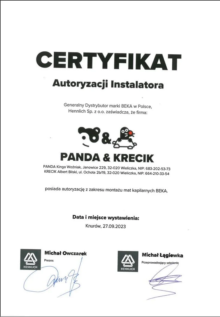 Certificate of authorization for installer Panda & Krecik, issued in Knurów on September 27, 2023, with signatures from officials Michał Owczarek and Michał Łągiewka.