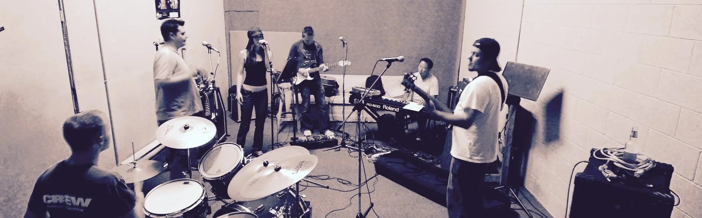 Group-of-musicians-practicing-in-a-music-studio