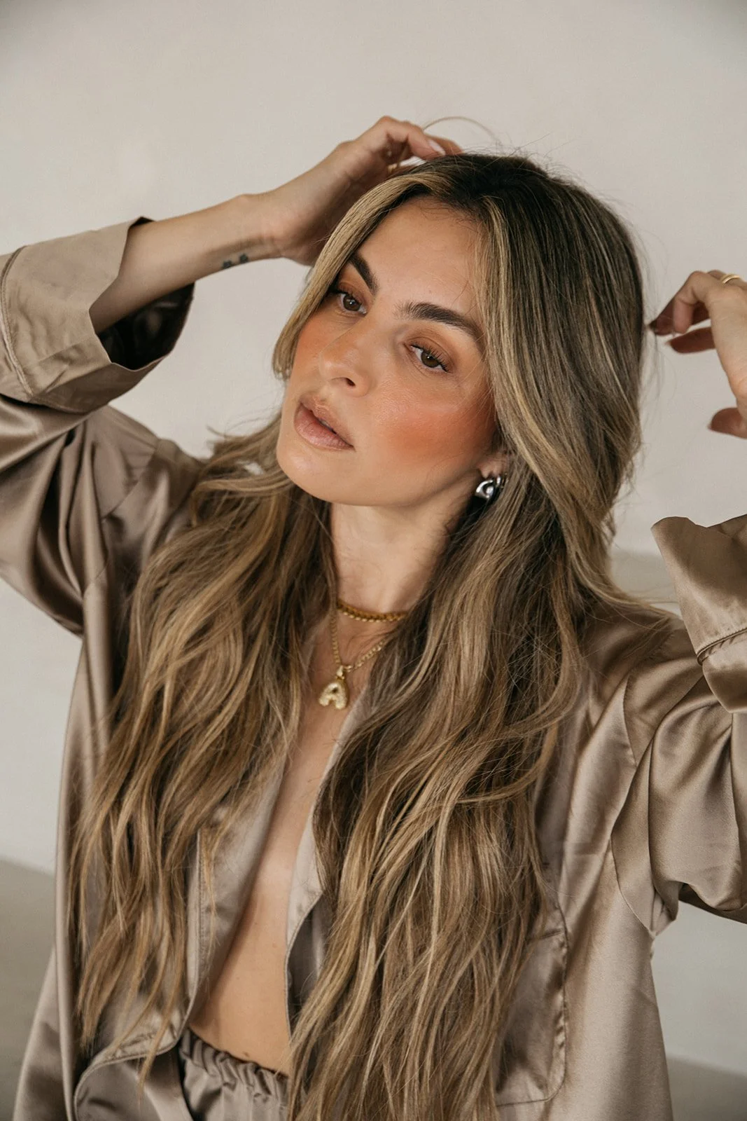 Amada Flores, founder of Melt West, reflecting the studio's refined approach to natural beauty.