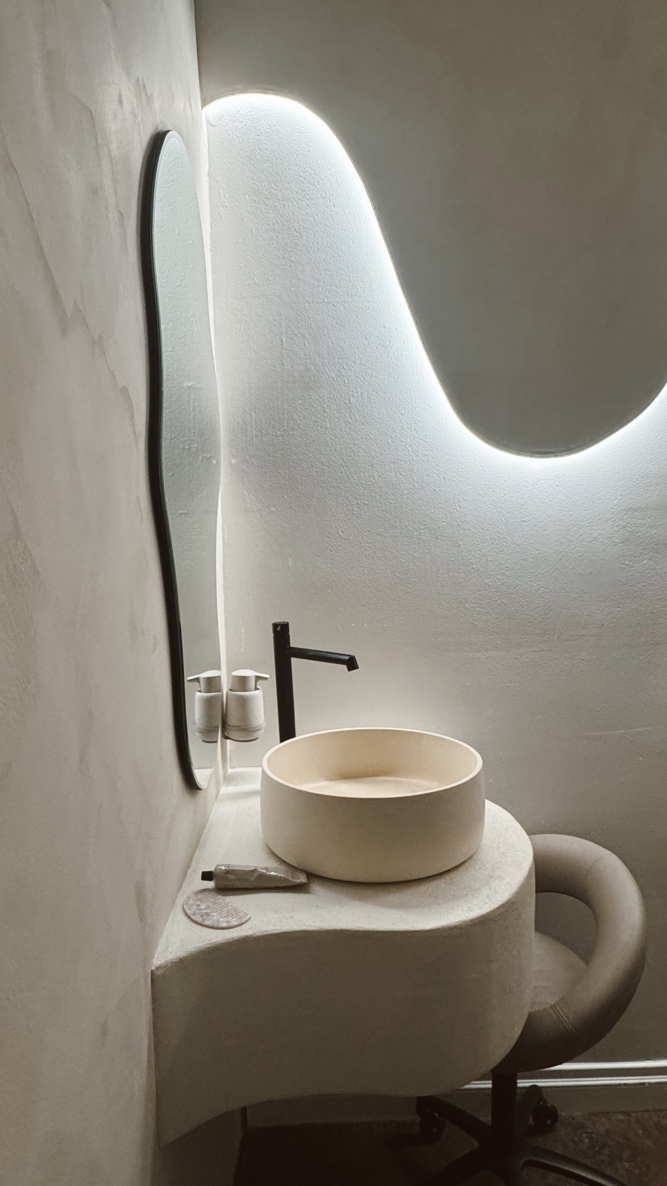 Thoughtfully designed treatment space at Melt West featuring clean lines, natural materials, and refined details.