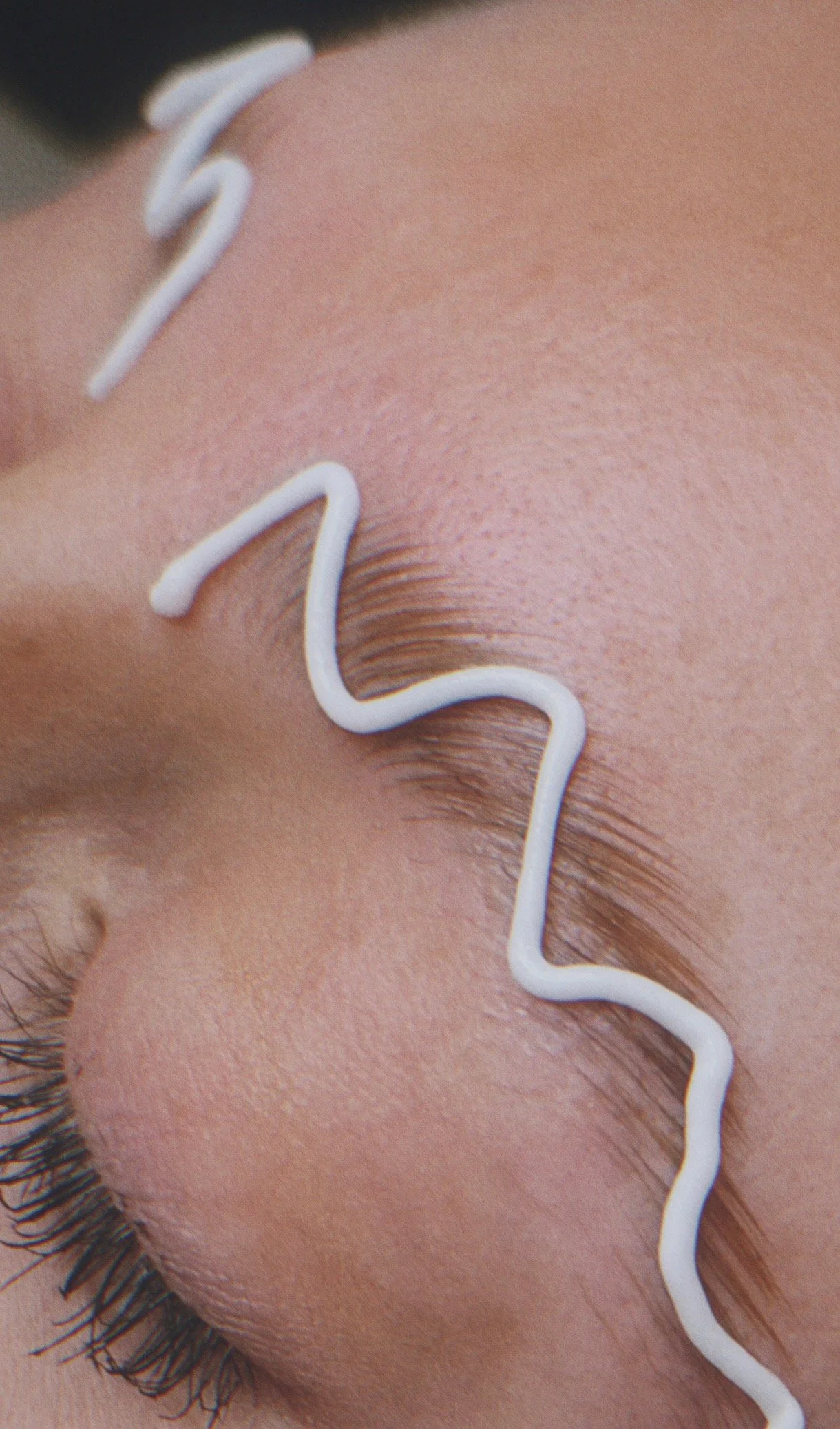 Brow lamination treatment with conditioning cream applied during the service