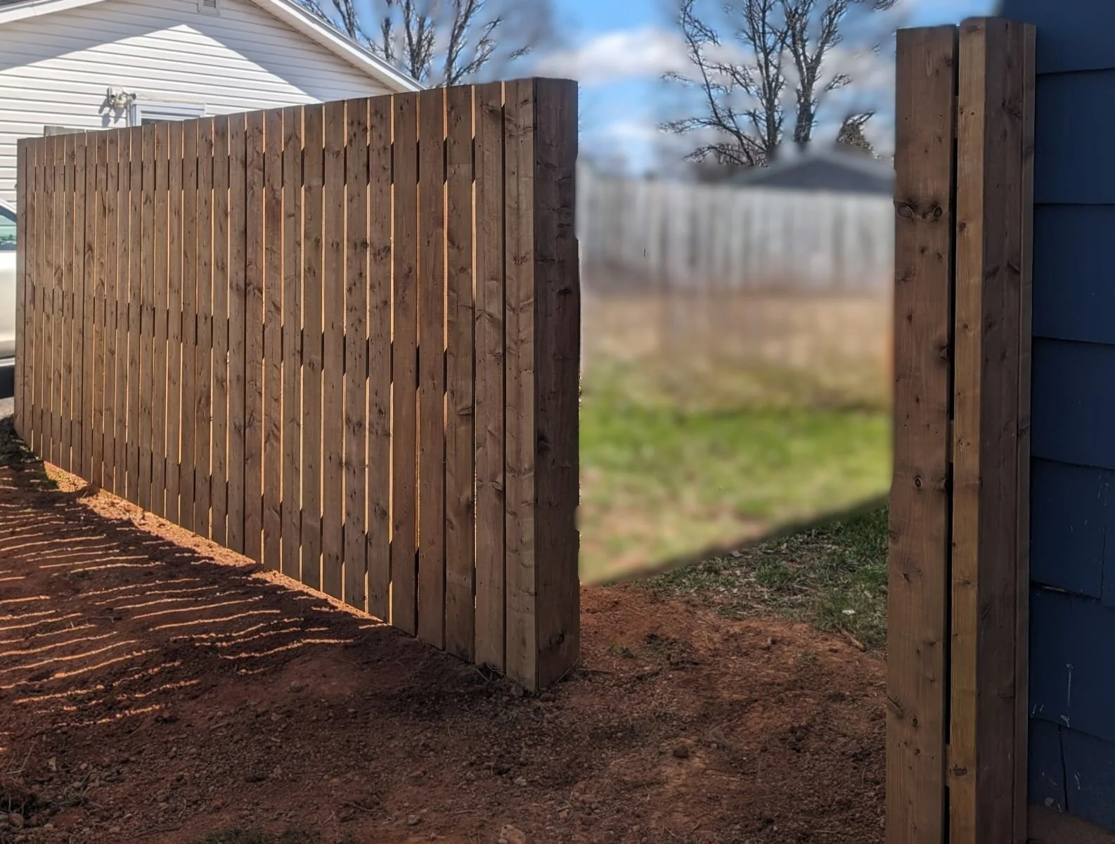 Pressure treated wooden fence built for a home owner in Charlottetown, PEI