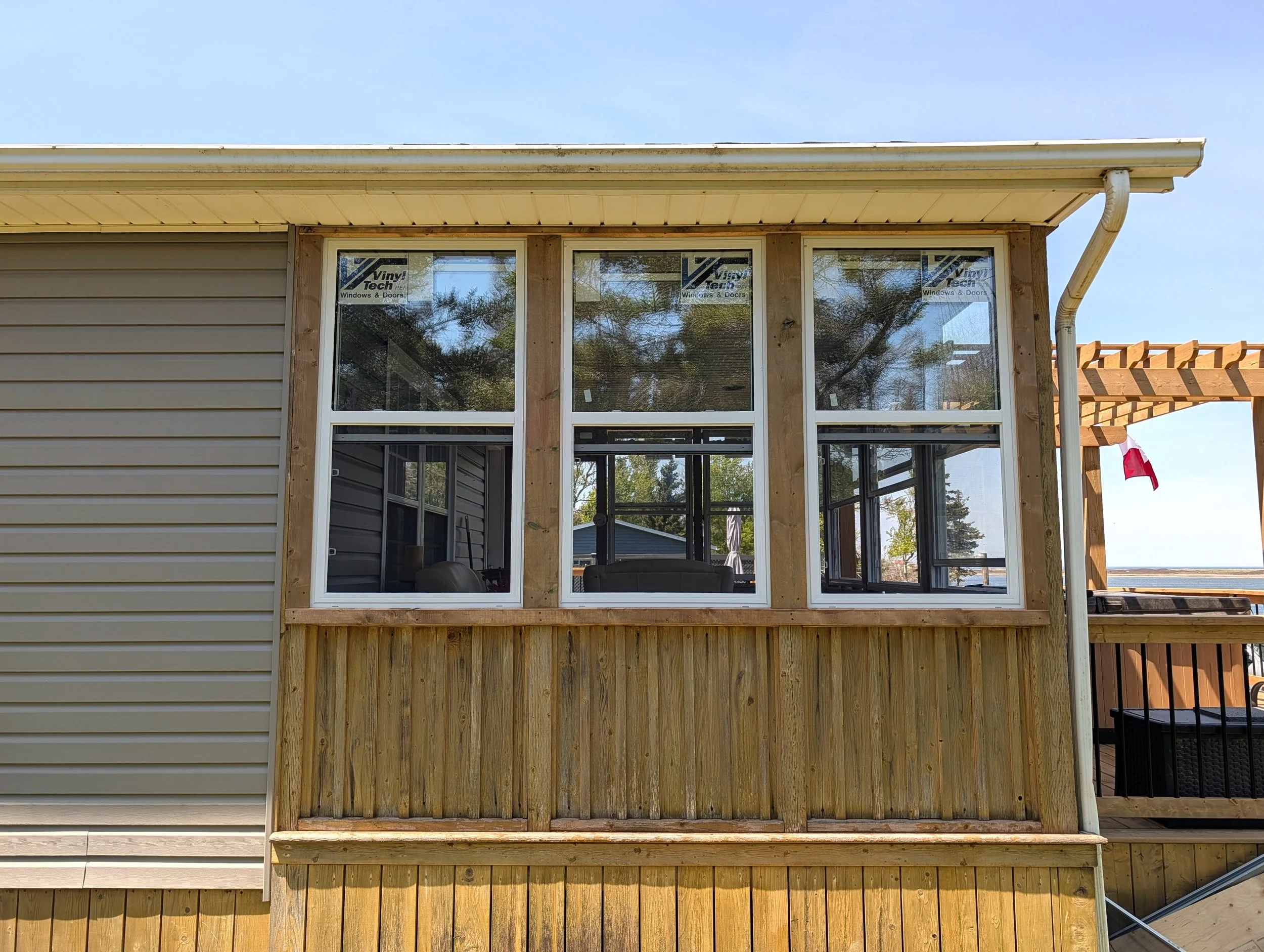 Enclosed sunroom for a homeowner in West Covehead, PEI 