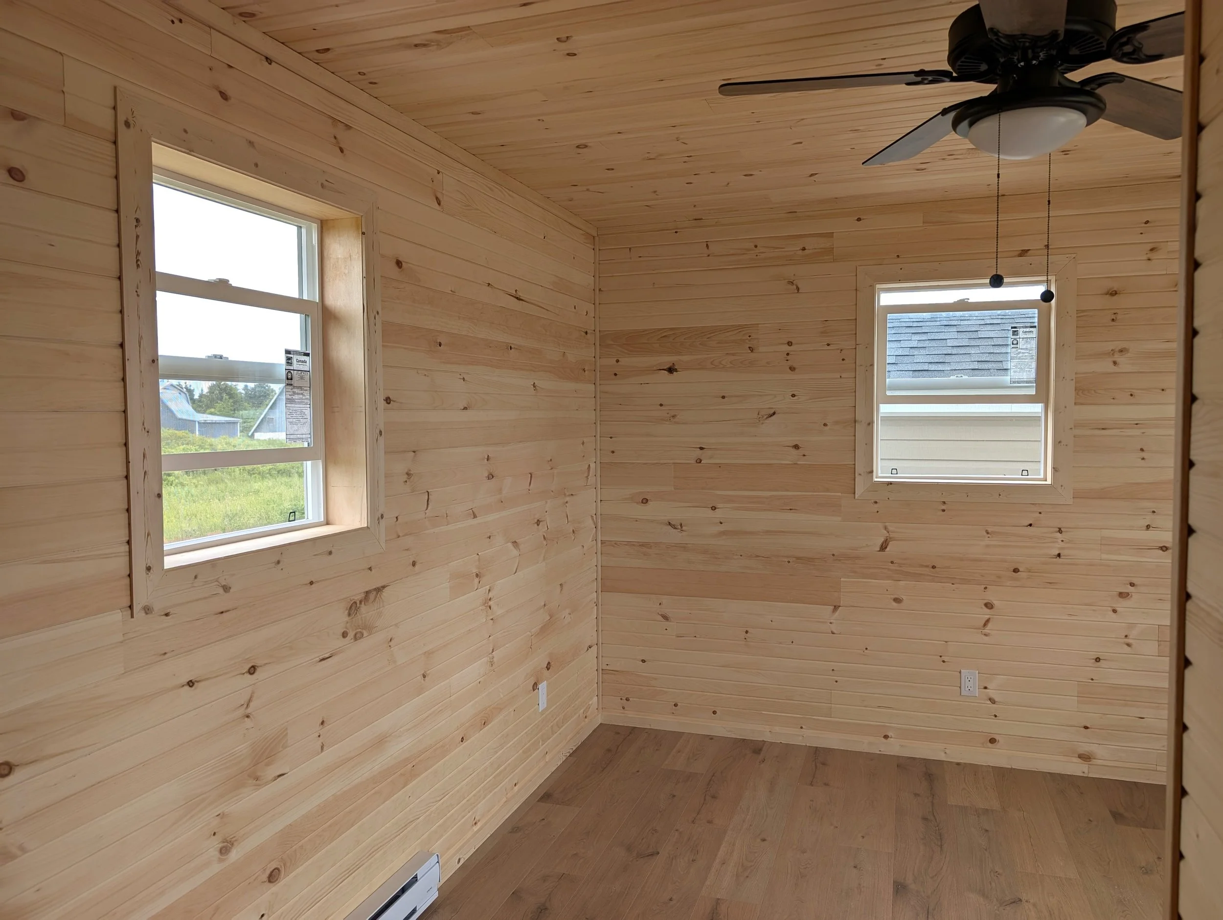 Custom designed and built 12 x 16 Bunk House with pine interior built for cottage owner in Canoe Cove, PEI.