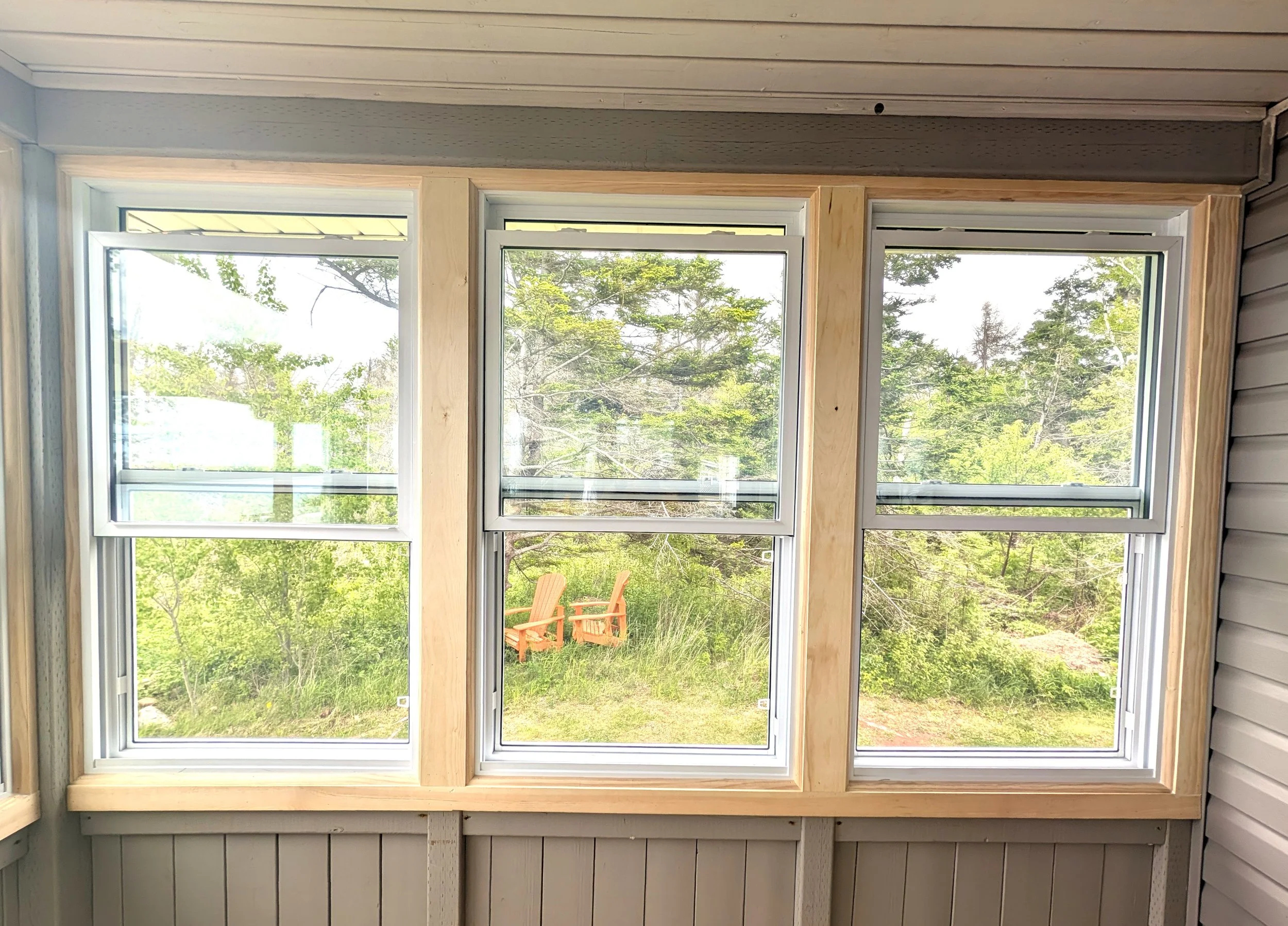 Enclosed sunroom for a homeowner in West Covehead, PEI 