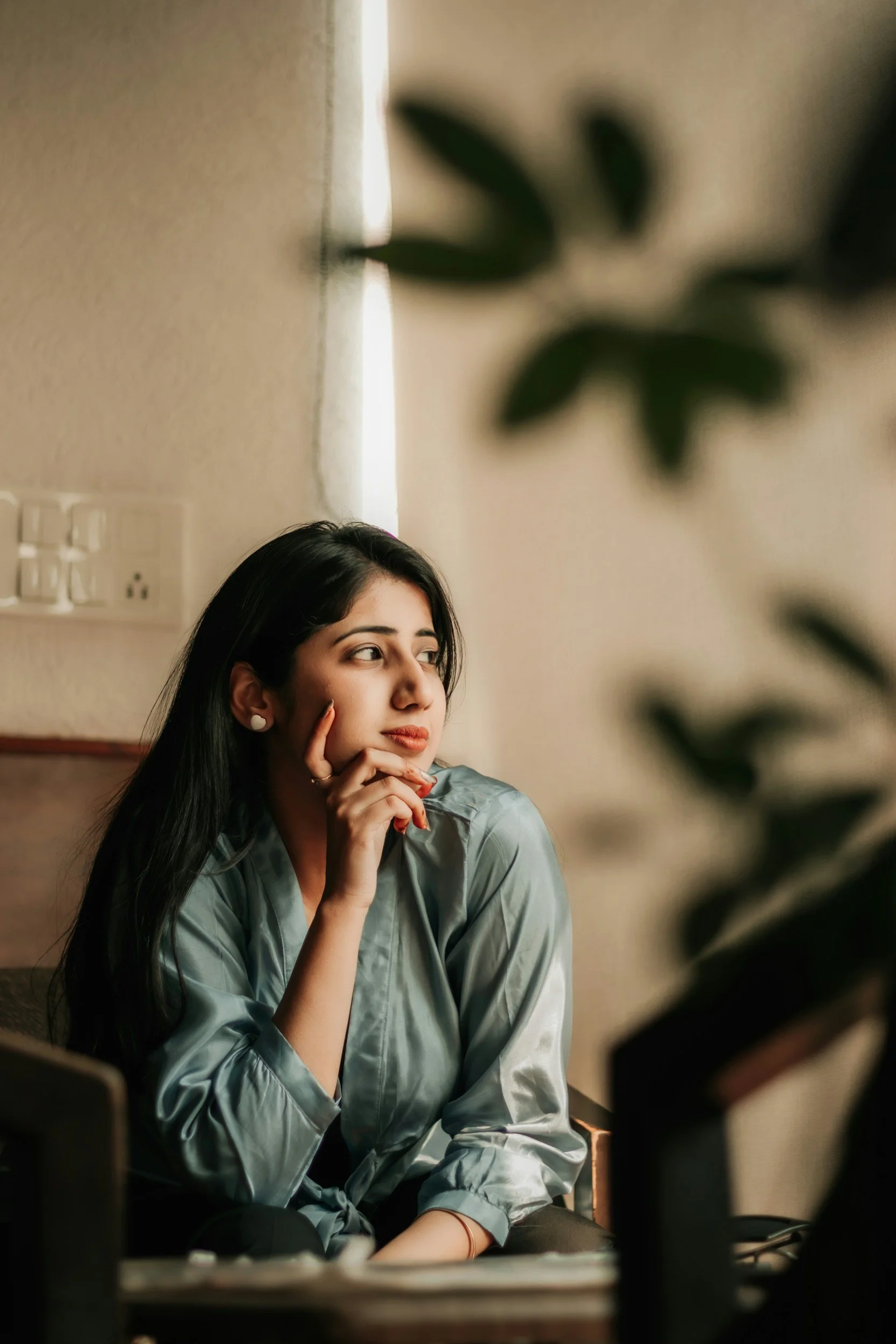 Adult in reflective therapy session for trauma and anxiety