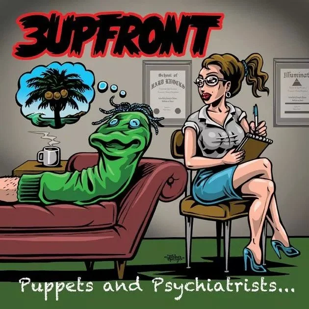 Cartoon of a psychiatrist and a puppet on a couch, with a thought bubble indicating the puppet is dreaming of a palm tree. The background shows framed certificates. The image has a humorous caption about puppets and psychiatrists.