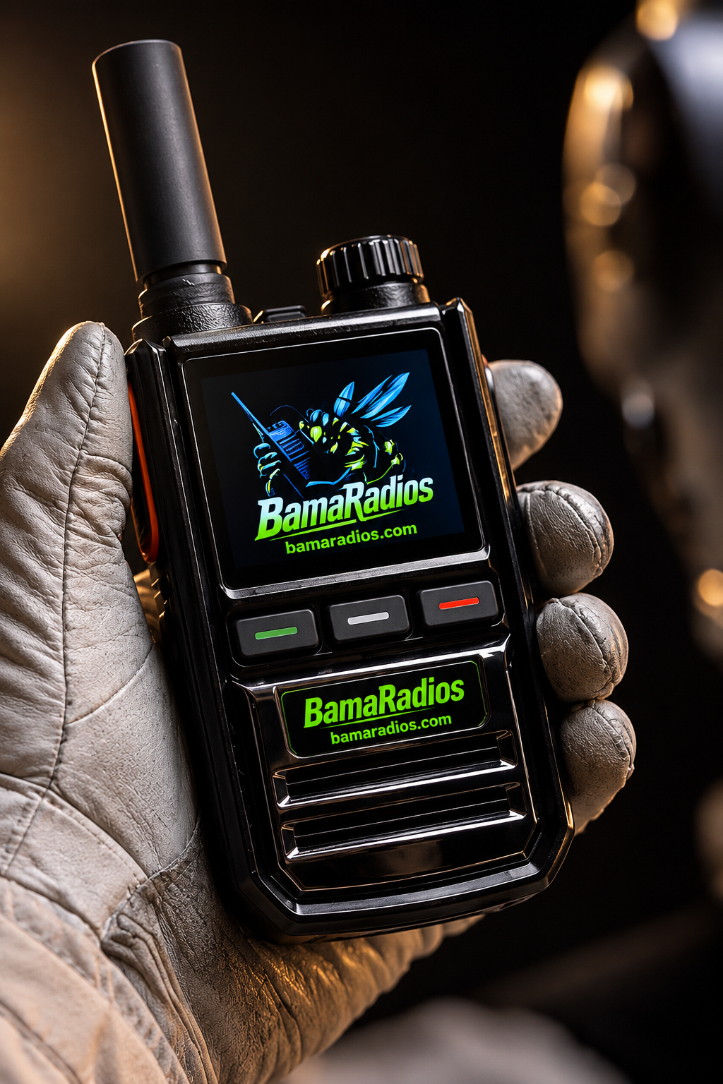 Close-up of a handheld police radio device with a digital screen displaying the logo of Bama Radios, featuring a wasp holding a radio, with the website bamaradios.com written underneath. The person's gloved hand indicates use in a professional or outdoor setting.