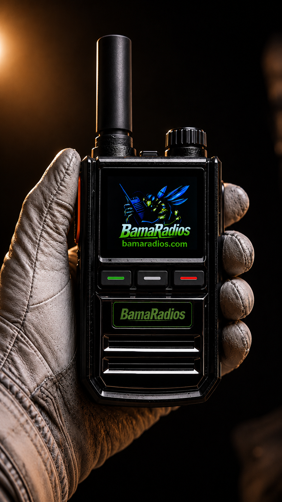 A person in a leather glove holding a walkie-talkie with the Bama Radio logo and website on the screen.