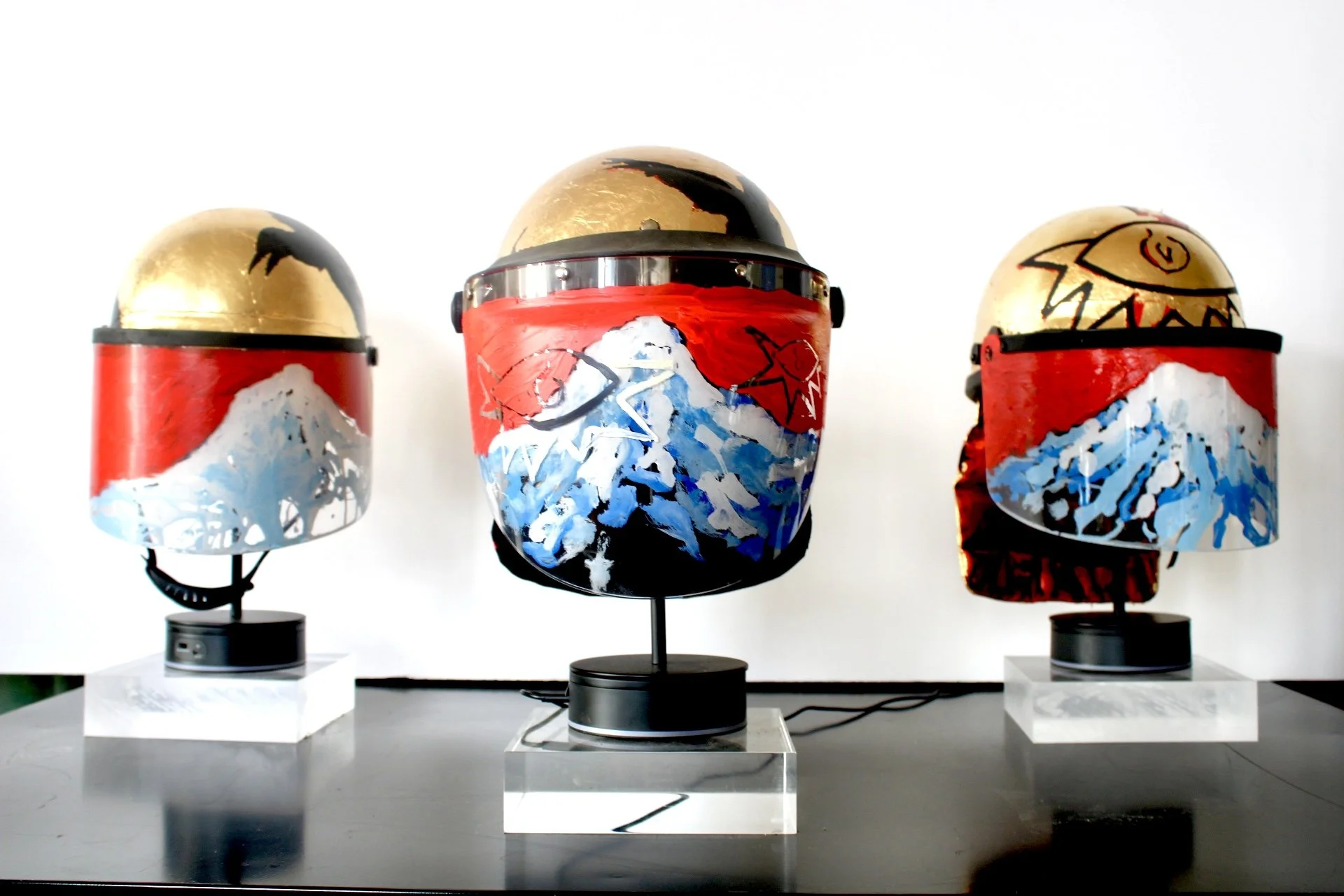3 Separate Riot Police Helmet Paintings

"Whwn the River Runs Red"
"Murder of Crows Helmet"
"Cyclops"

Acrylic and Imitation Gold Leaf on Police Riot Helmet
18" x 12" x 10.5"
2024