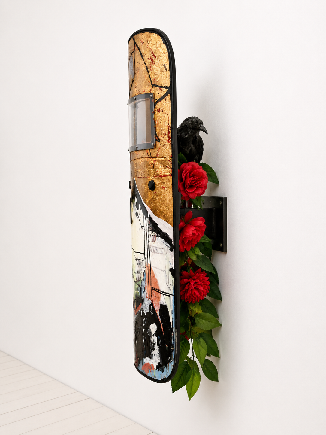 Training Kami (side view)

Acrylic and Imitation Gold Leaf with Hand Etched Plexiglass on Police Riot Shield with Paper Crow and Imitation Flowers
35" x 18.5" x 6"
2023 - 2025