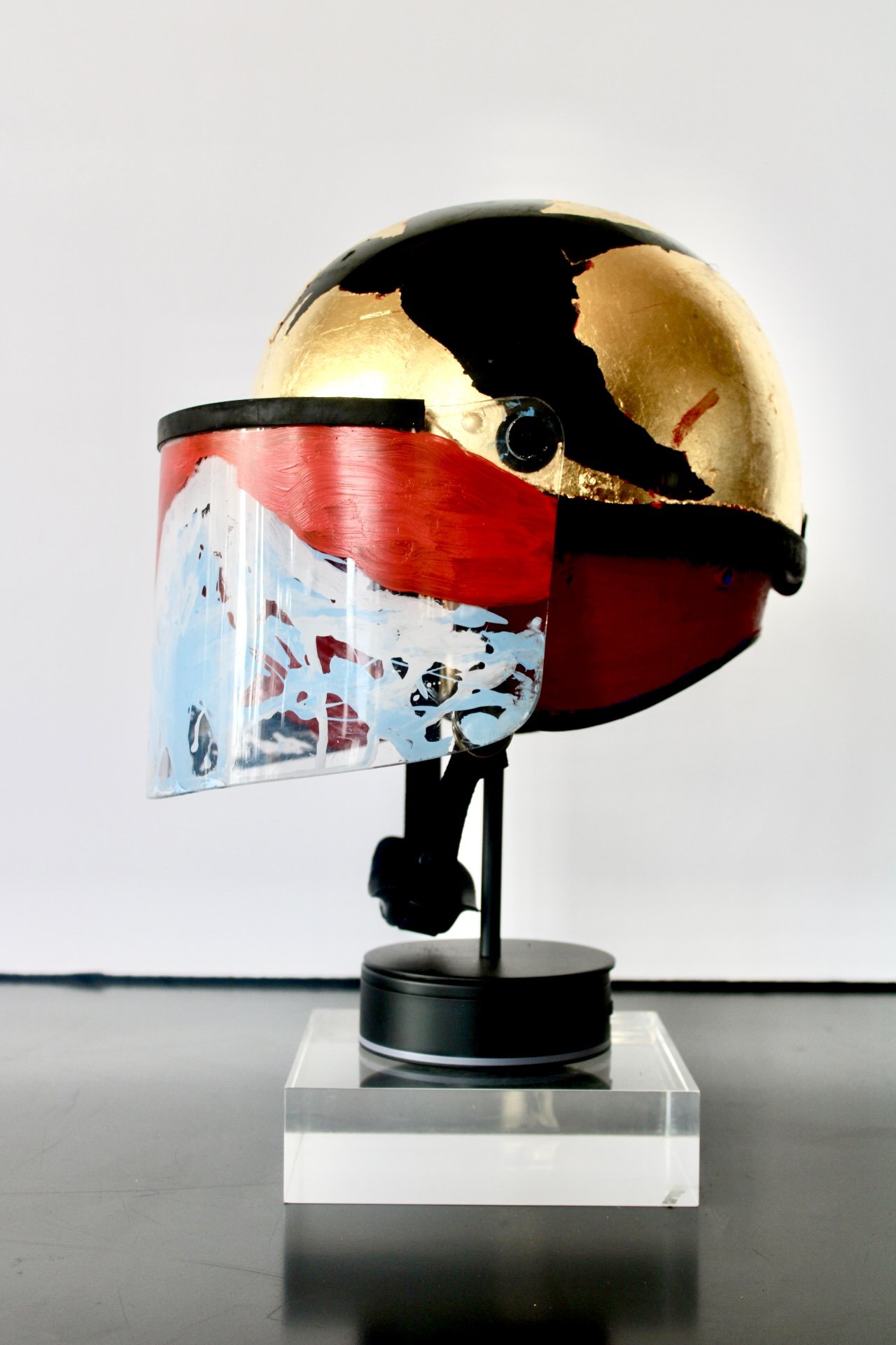 " Fuji and Crows" [side view]

Acrylic and Imitation Gold Leaf on Police Riot Helmet
18" x 12" x 10.5"
2024