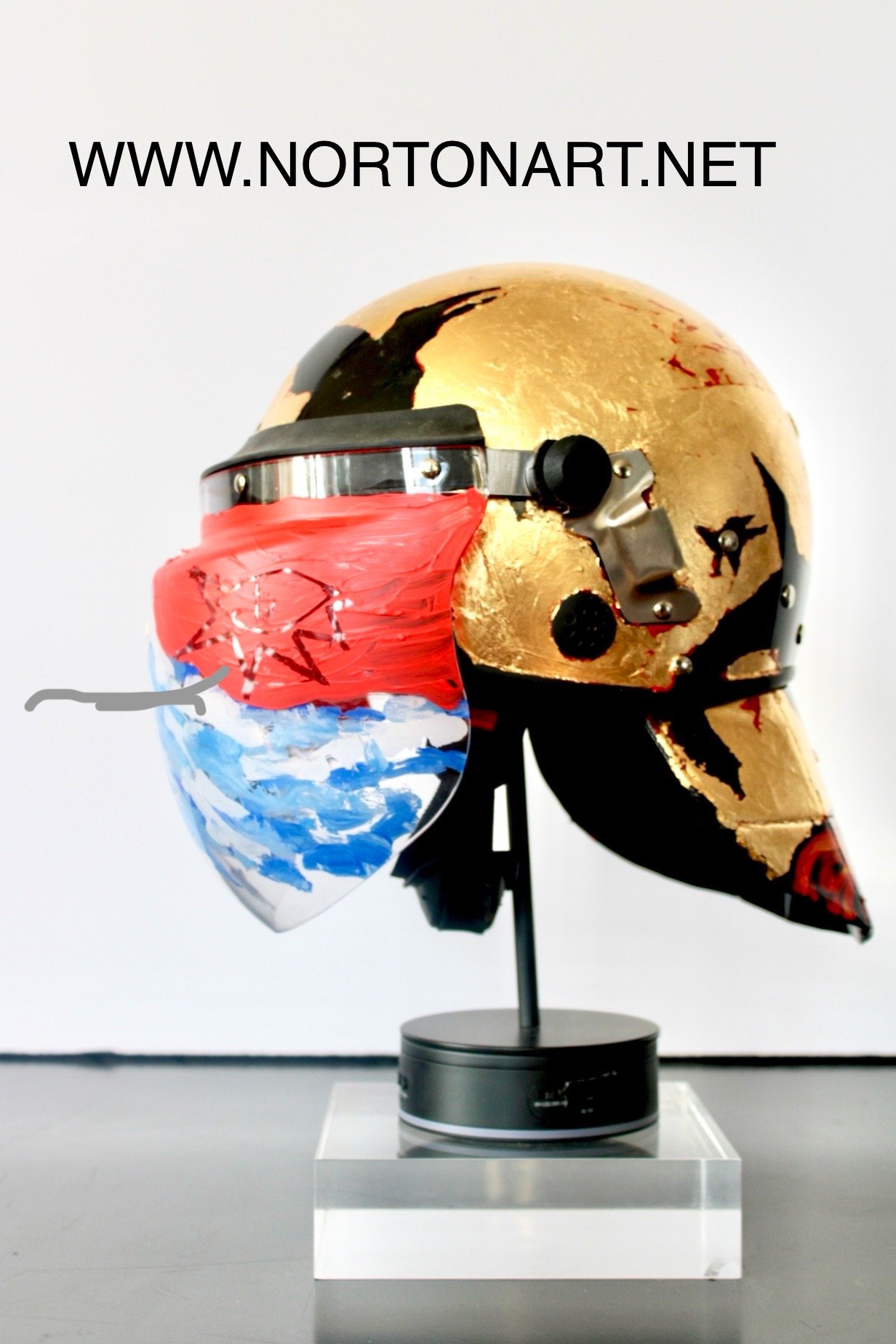 " Crows" [side view]

Acrylic and Imitation Gold Leaf on Police Riot Helmet
18" x 12" x 10.5"
2024