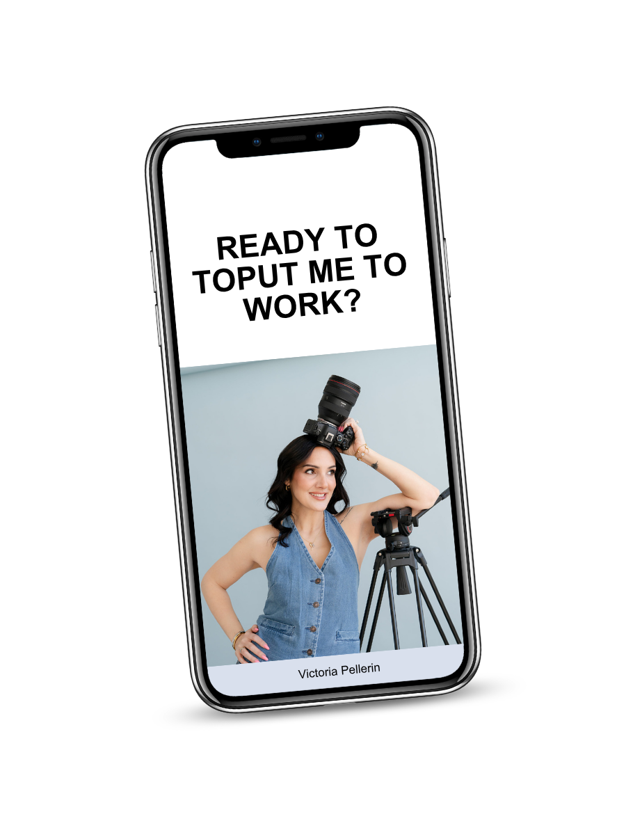 Smartphone screen with text 'Ready to top up me to work?' and an image of a woman holding a camera and tripod.