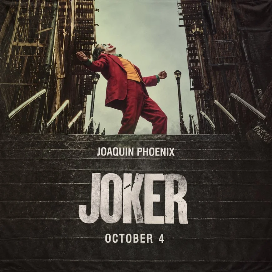 Joker movie banner with Joaquin Phoenix dancing on the stairs, the surface VYAL will paint