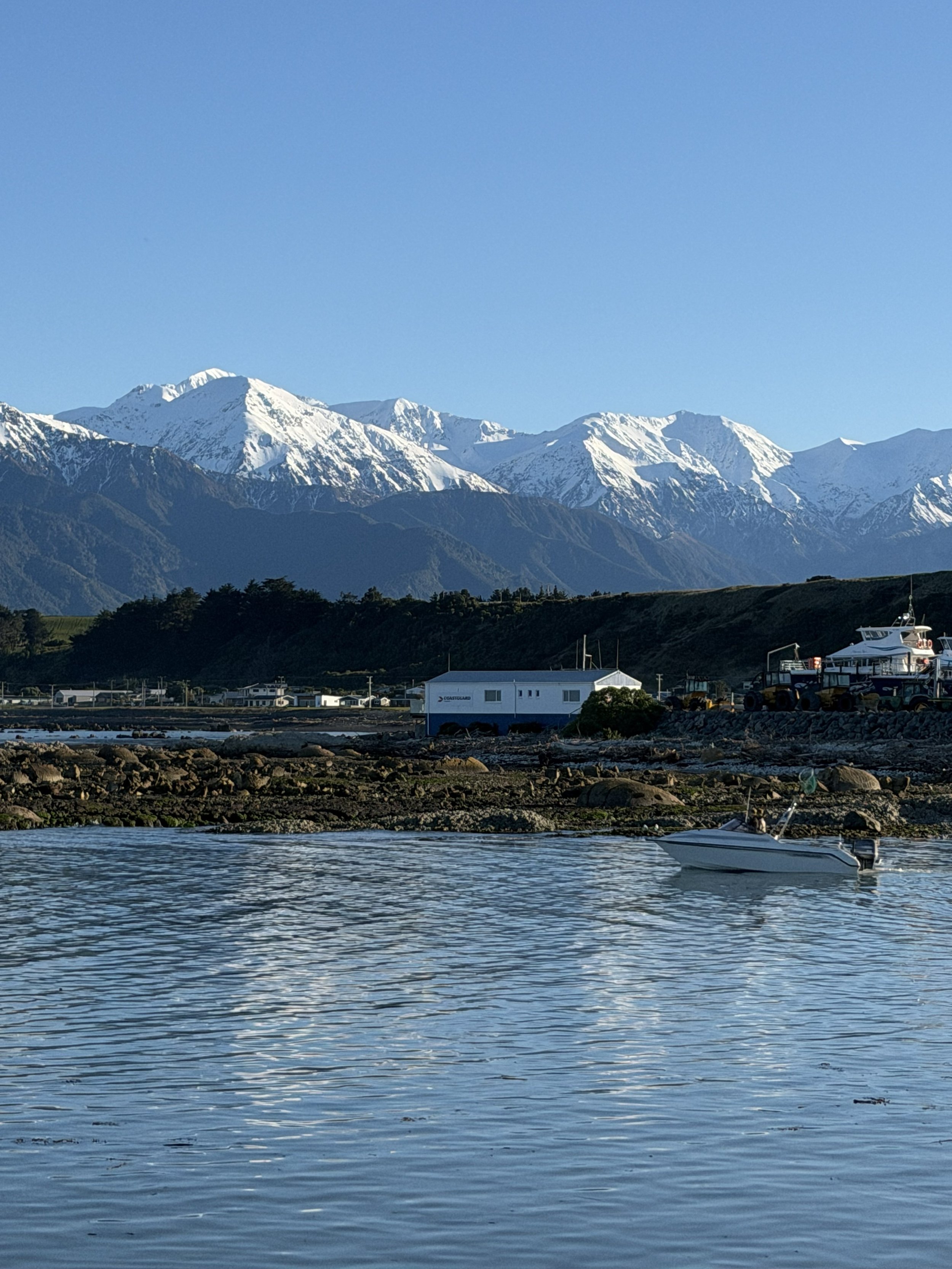 Kaikoura Ranges with local fisherman