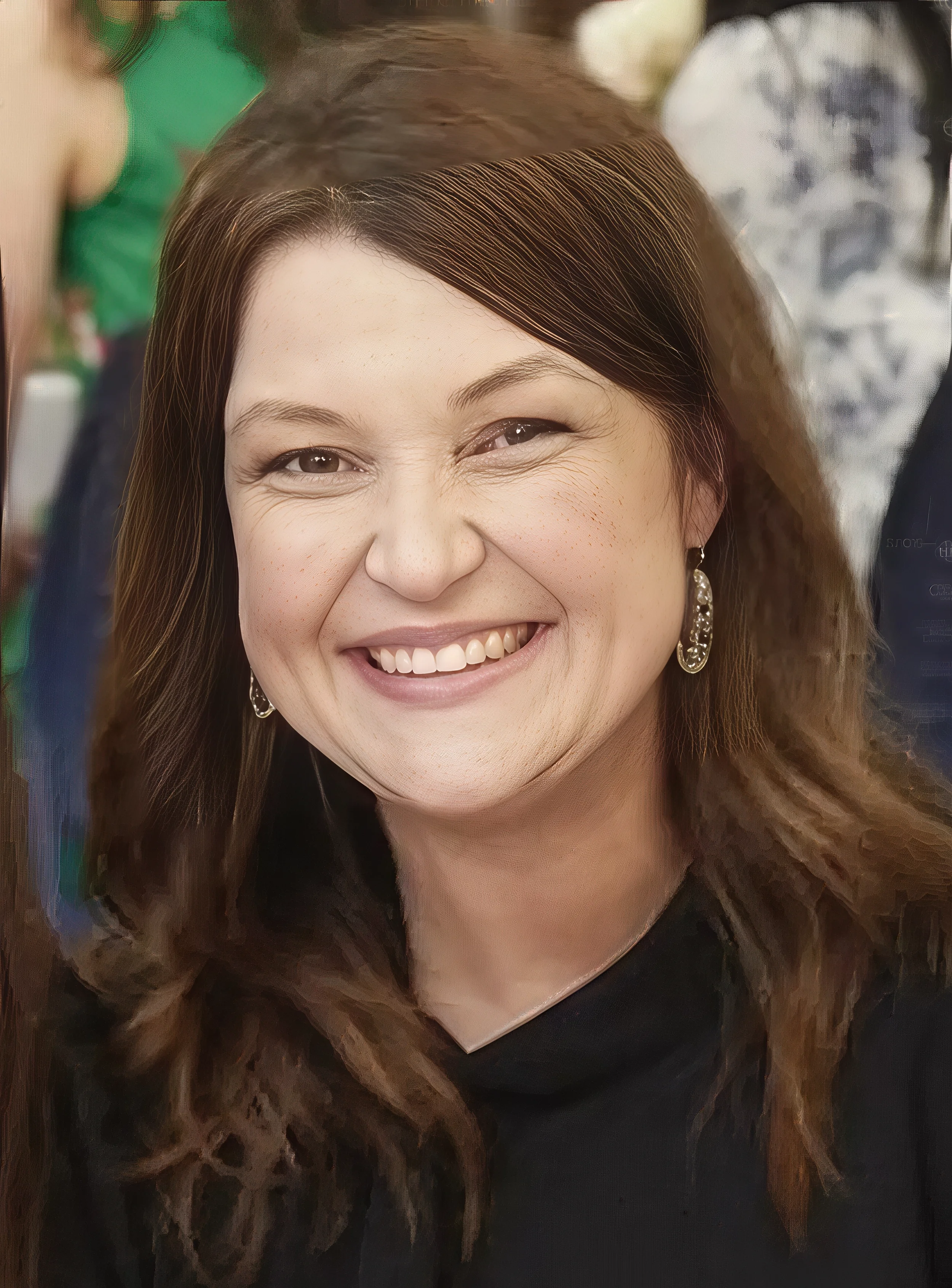 Headshot of Marie Heidemann, Catholic counselor in Texas, smiling outdoors