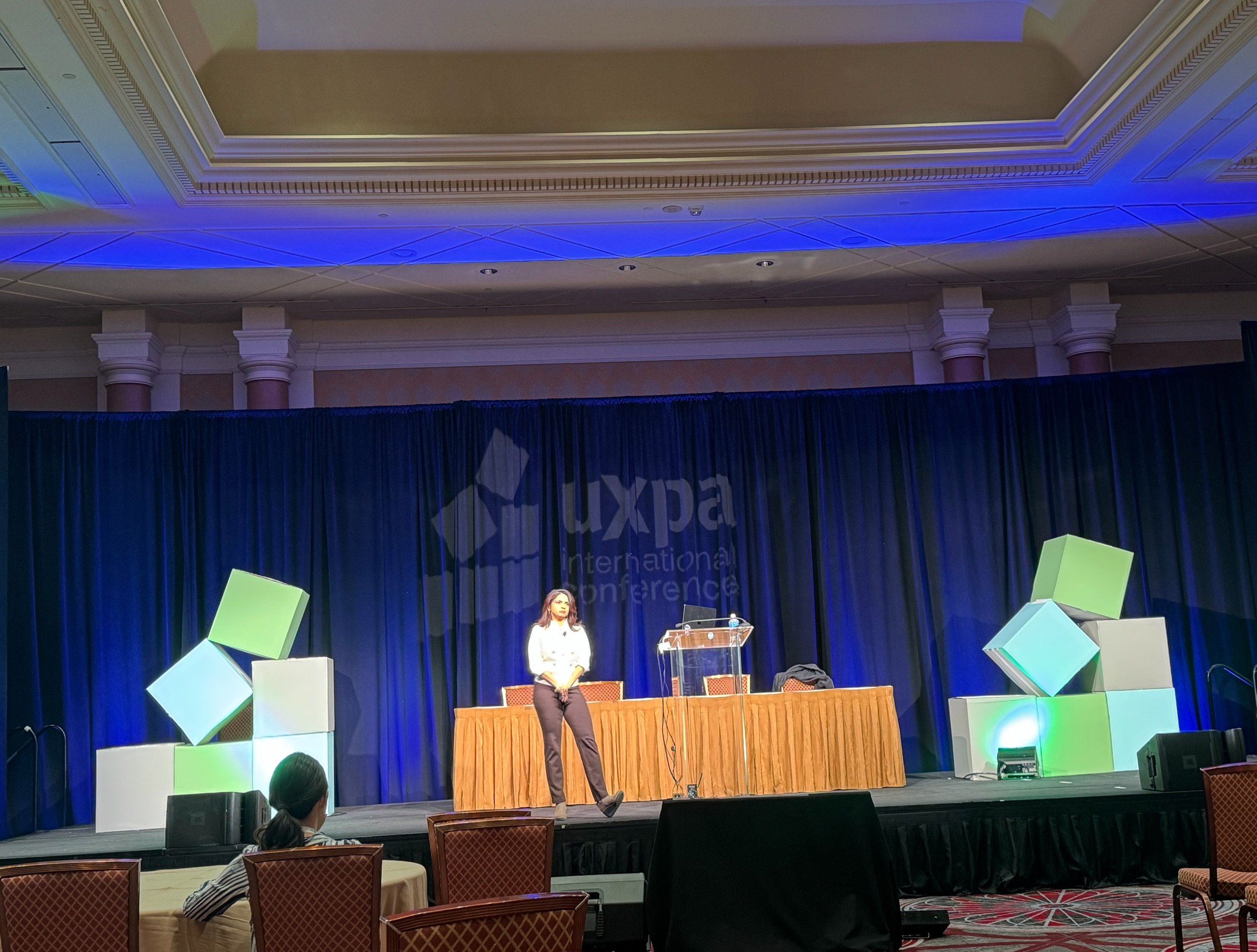 Niketa Jhaveri delivering a keynote on AI innovation and human-centered design at UXPA International 2026.