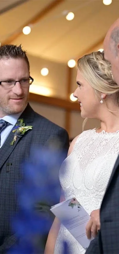 The bride with her father at the aisle with the groom during the ceremony, which I discreetly filmed vertically for social media content.