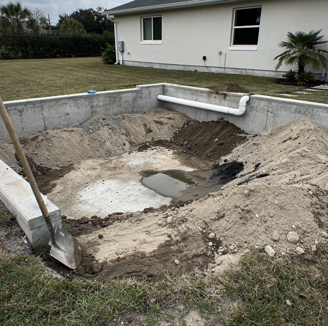 backyard dirt fill over empty in-ground pool
