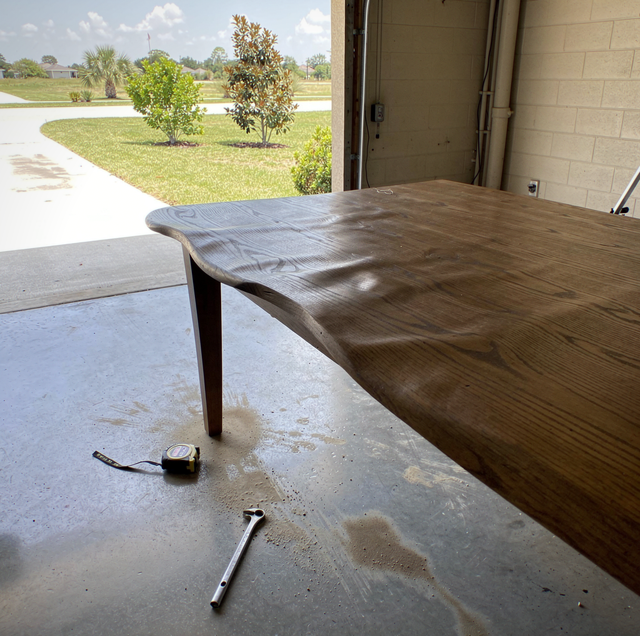 waterlogged dresser door swollen wood warped grain