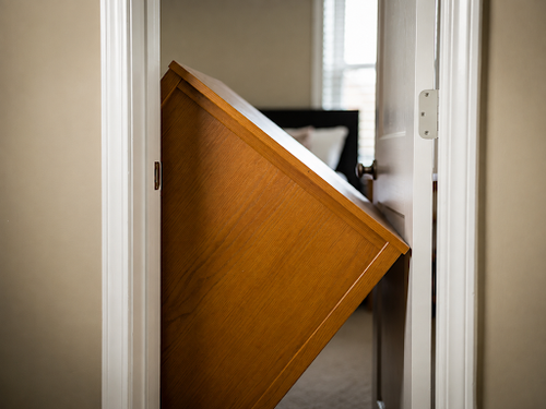 tape measure spanning interior doorway clear opening