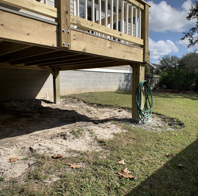 side-by-side wood decks differing in height and condition