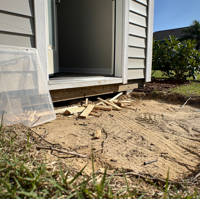 deck-free doorway slab framing exposed above ground