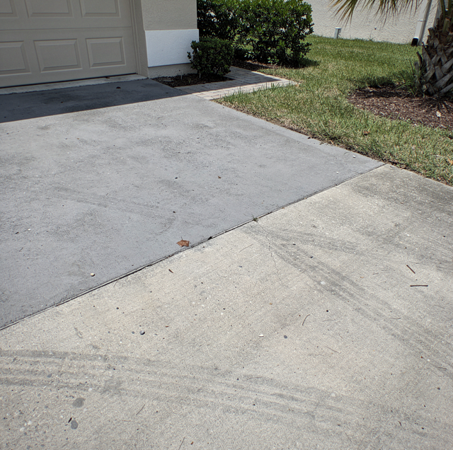 cracked old concrete slab receiving thin new overlay