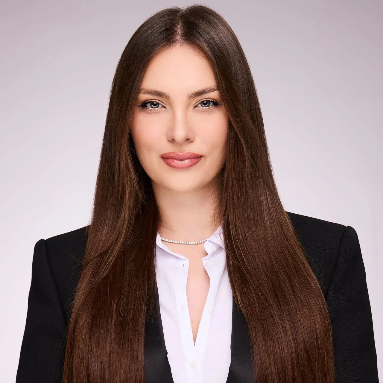 clean-light-gray-professional-headshot-of-a-woman-business-suit-Burbank-CA.jpg
