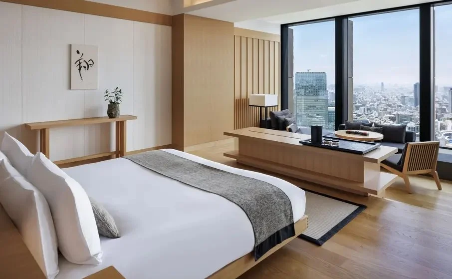 Guest room at Aman Tokyo overlooking the city skyline