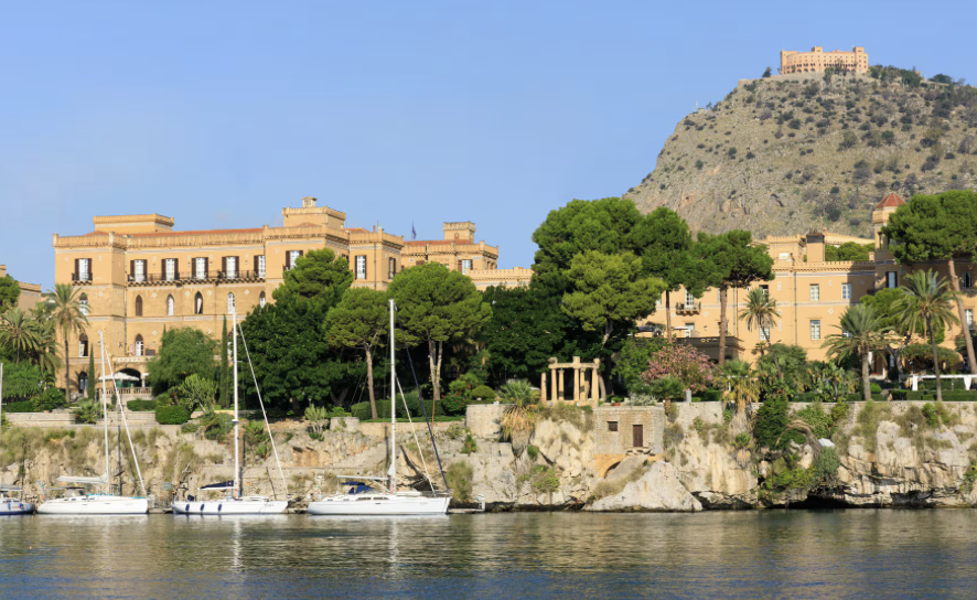 The Belle Époque façade and gardens of Villa Igiea above the Bay of Palermo, Sicily.