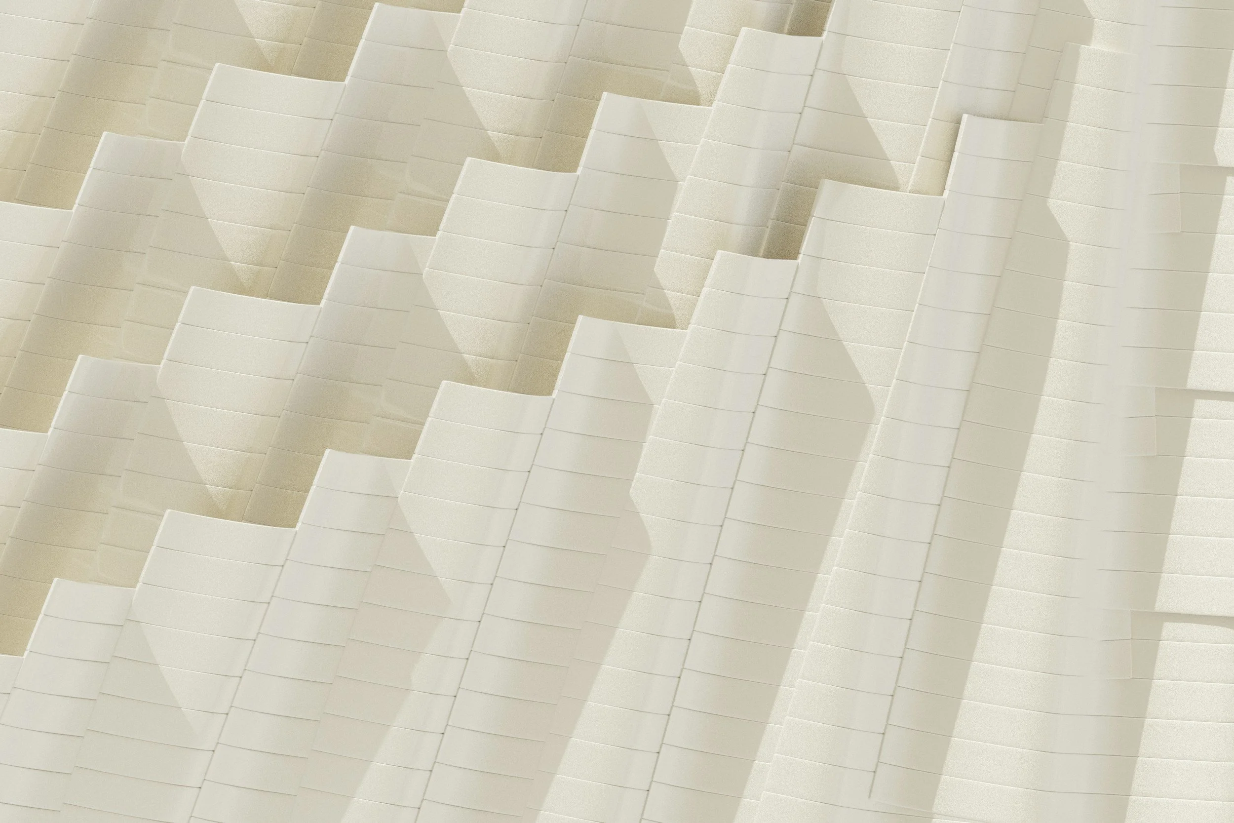 Pleated Blinds — Elegant and compact, pleated blinds offer a sophisticated window solution with excellent thermal performance. They work particularly well within conservatories, glazed extensions and shaped windows where standard blind systems may no
