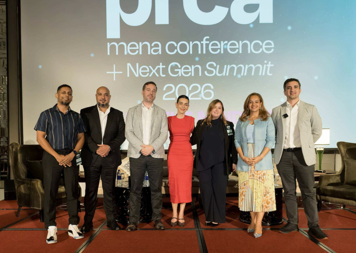 Abby White on stage with panelists at the PRCA MENA conference 2026
