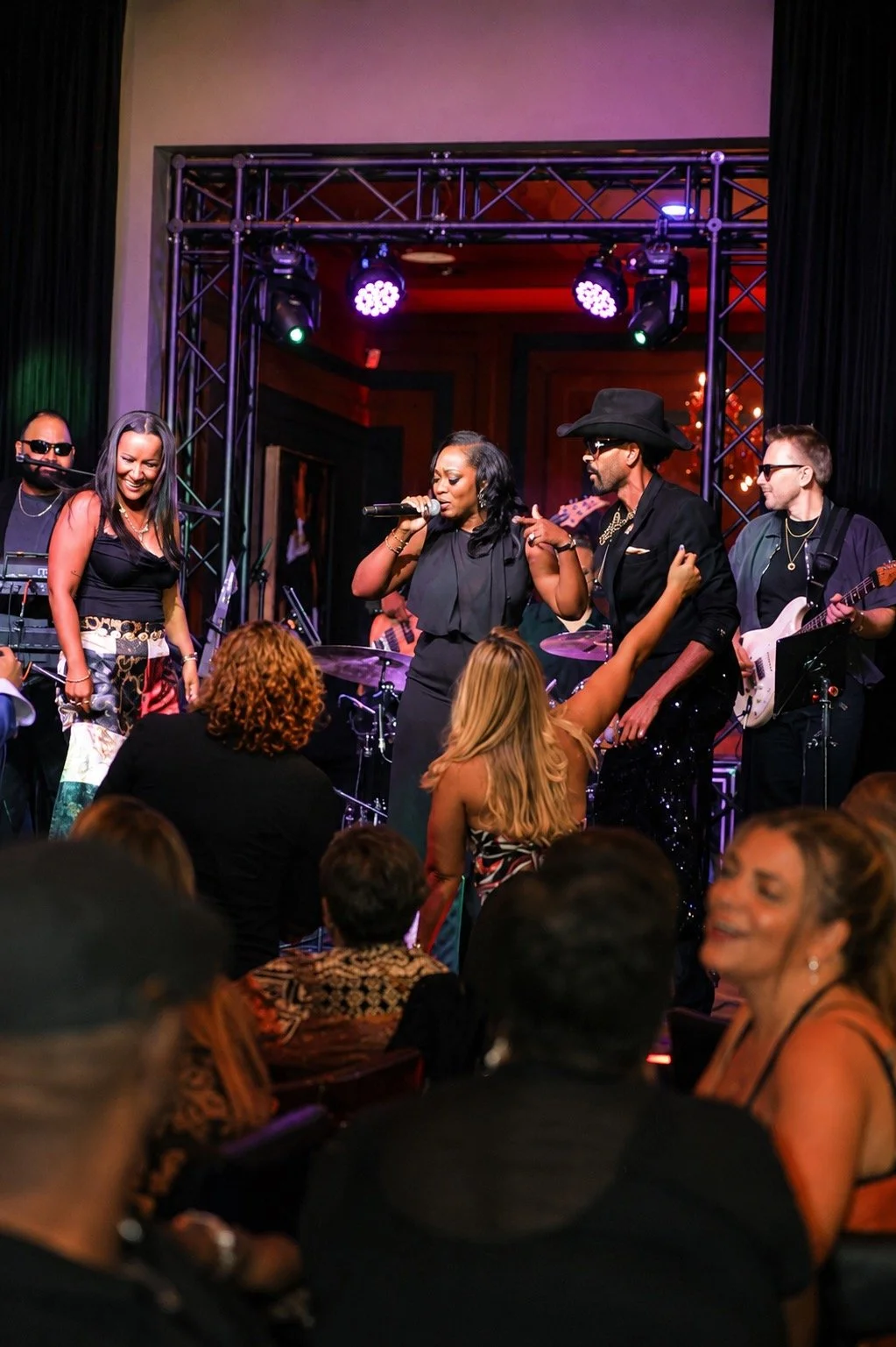 Soule Society full band performing a luxury concert-style experience with live musicians, vocals, and entertainment.