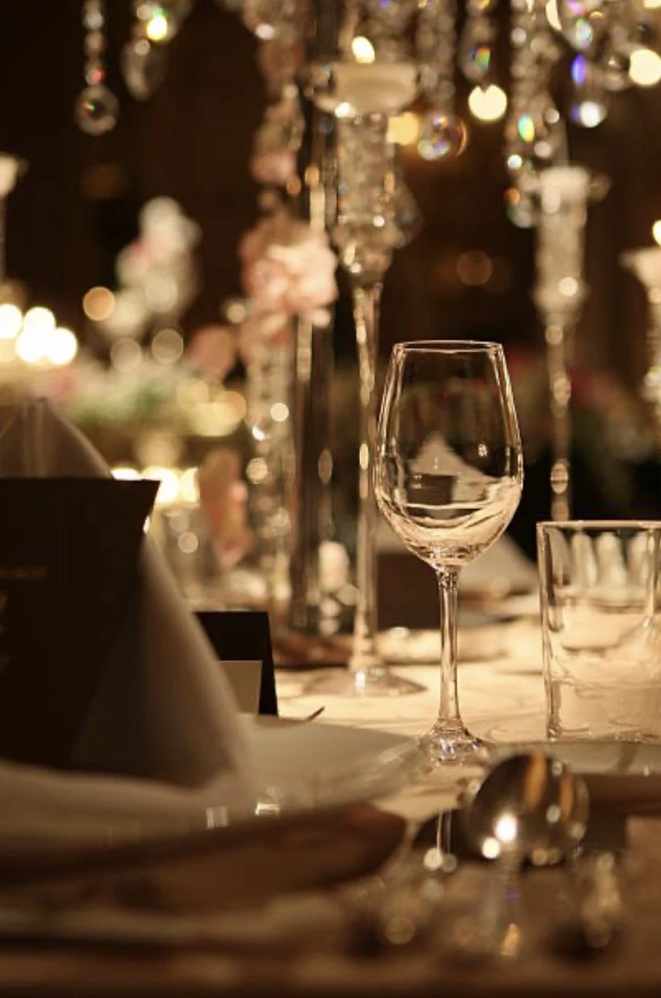 Elegant luxury event reception with warm lighting and elevated atmosphere featuring live entertainment by Soule Society.
