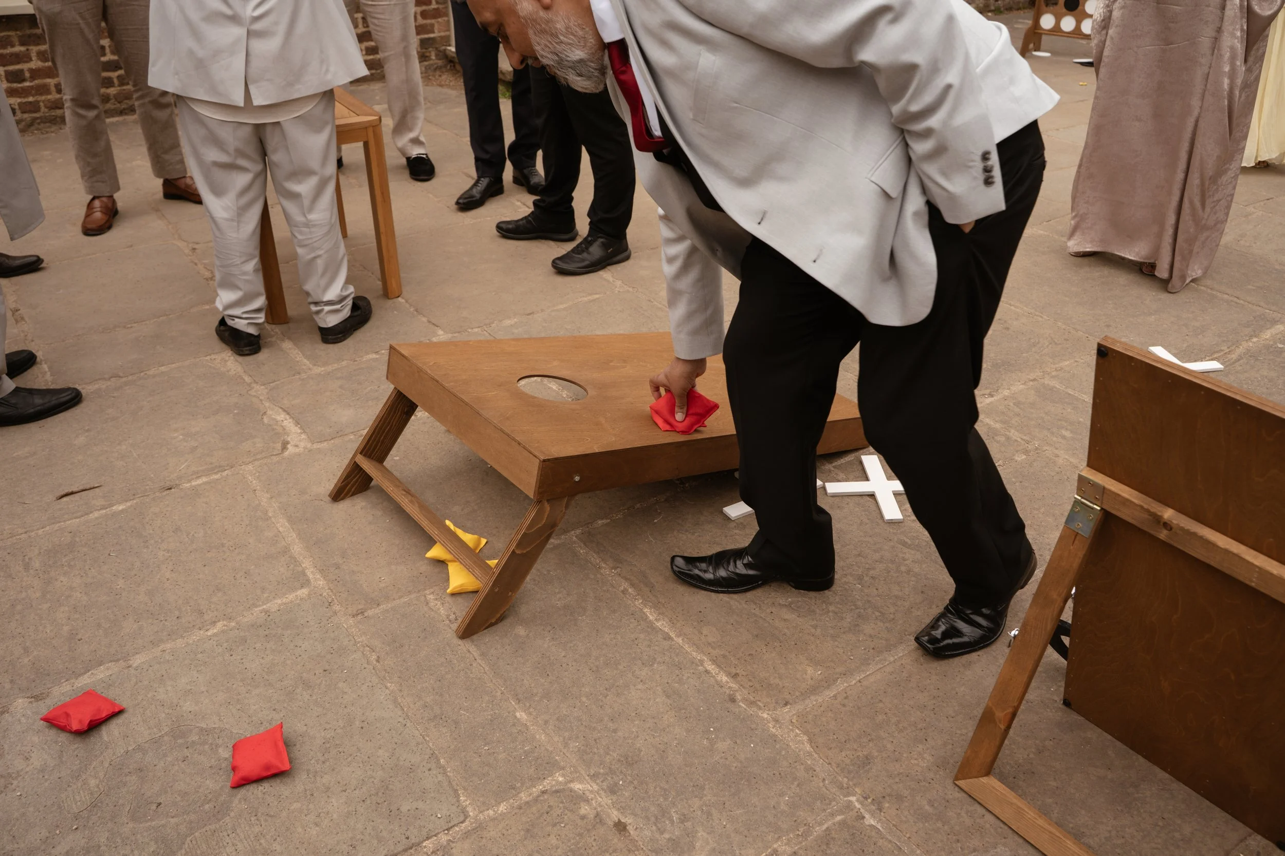 Premium outdoor games collection by Social Set, including Giant Jenga, Giant Connect Four, Cornhole, Ring Toss, Dominoes and Noughts & Crosses for event hire.